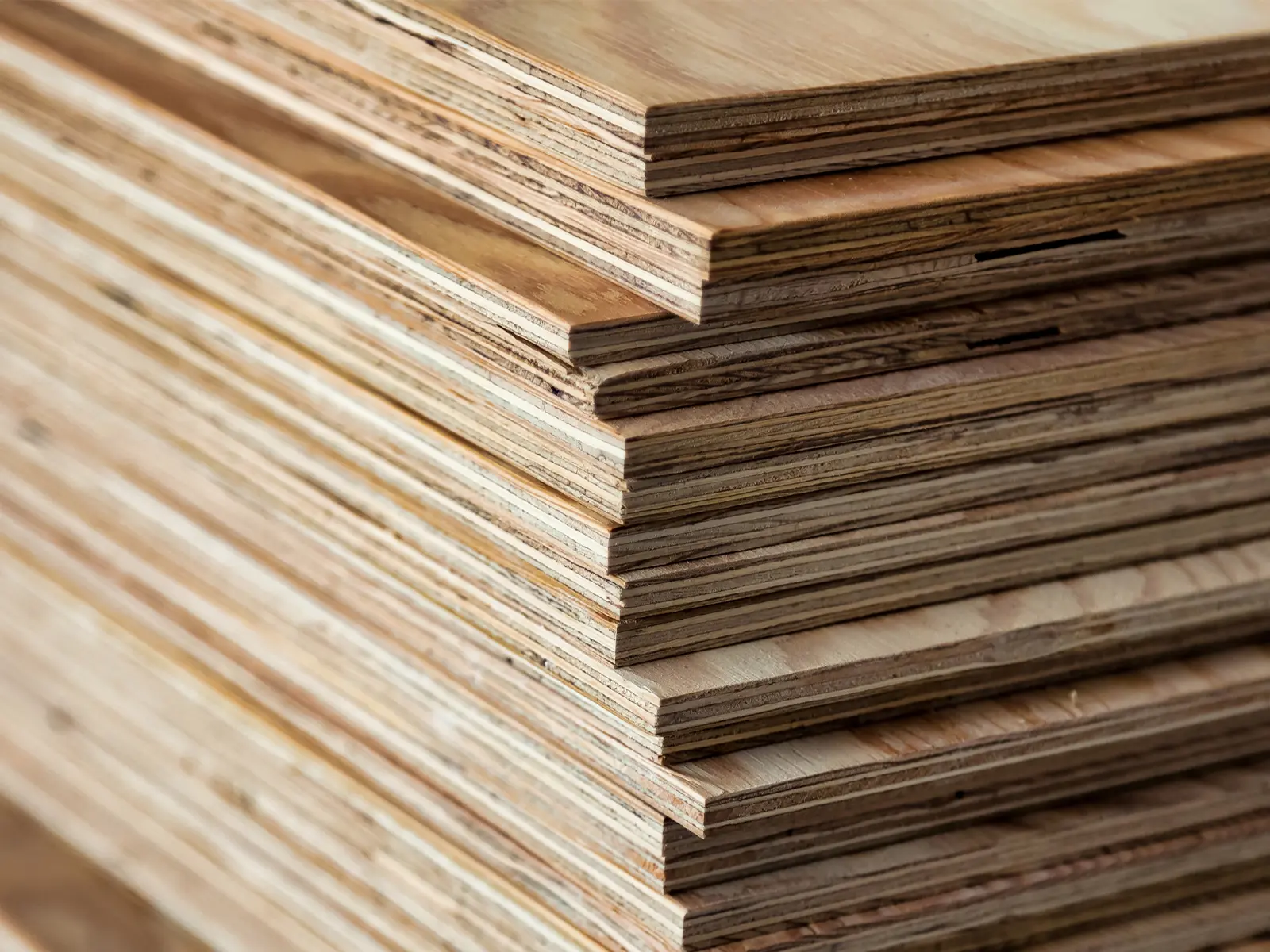 Stack of Lioher cross-laminated eucalyptus plywood sheets in 4' × 8' format, ready for cabinet, joinery and structural work